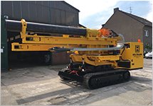 Tap hole drilling and resleeving machine for converters